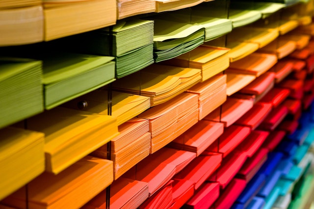 Multi-coloured folders piled up